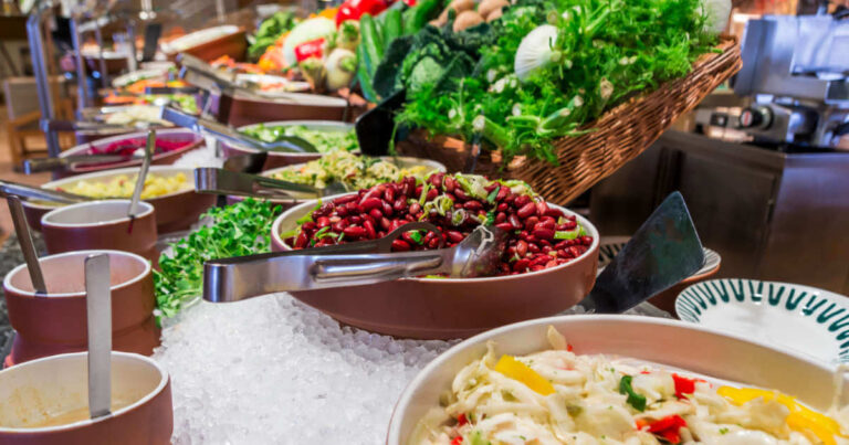 A range of healthy plant-based food served at the salad bar of the canteen for employees